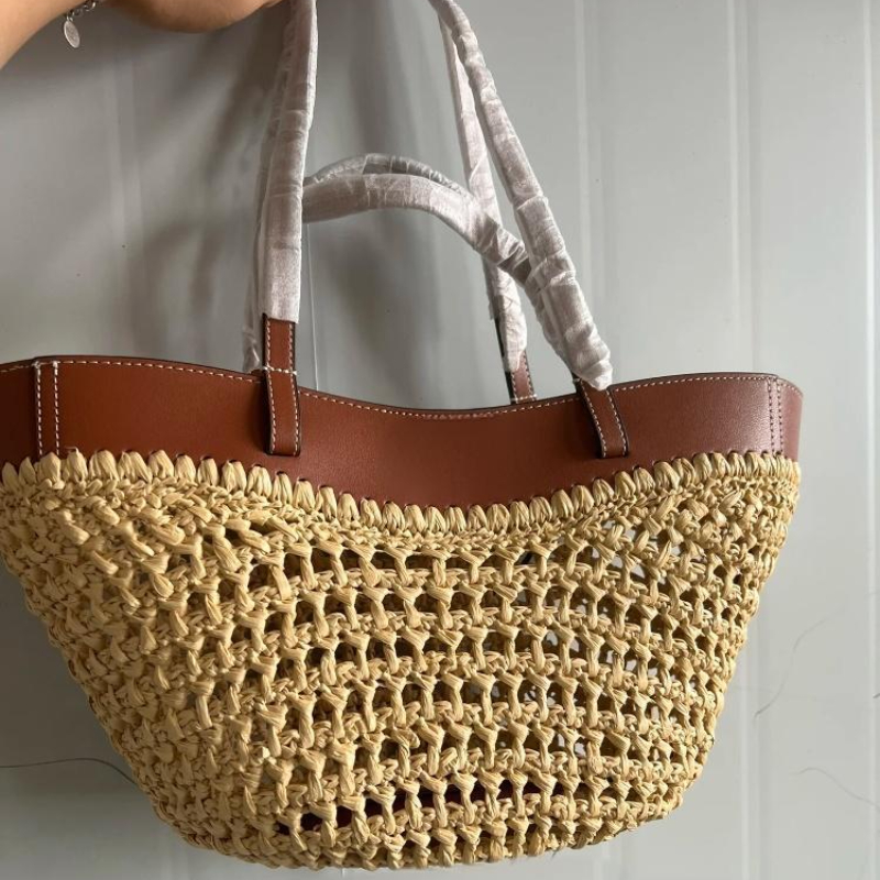 Luxury Bags For Travel - العلامة التجارية جوفاء المنسوجة حقيبة شاطئية
