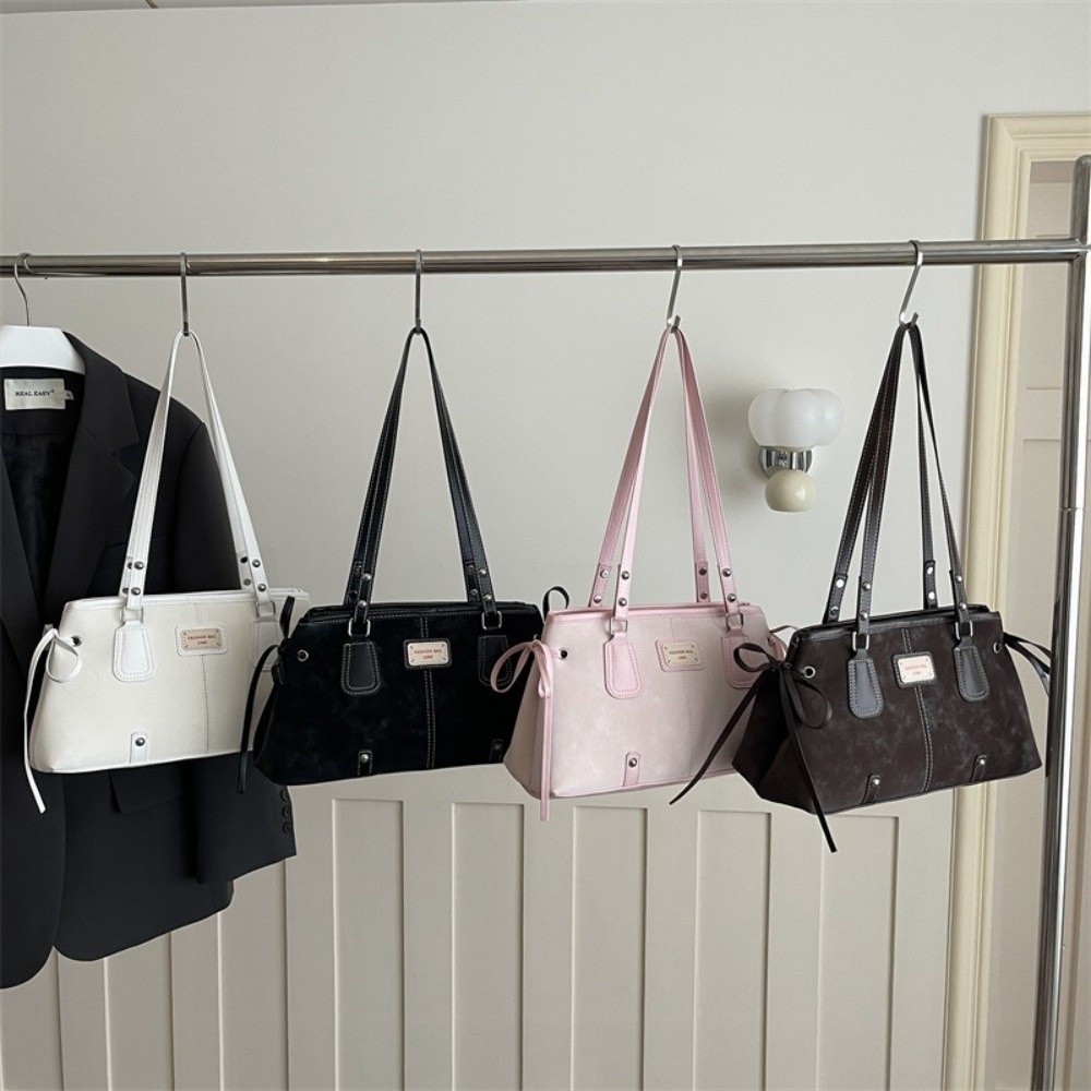 حقيبة يد من الجلد الصناعي بتصم - مراجعة Structured Handbag Top Handle وسعره